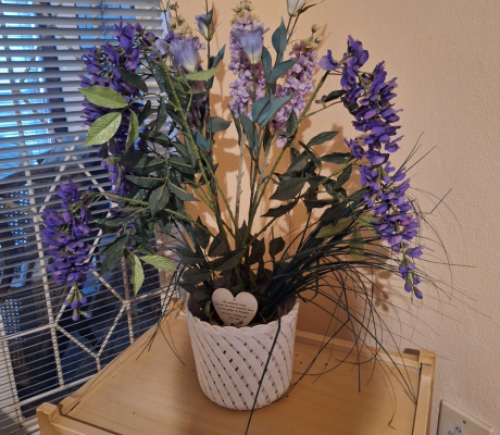 (ALB - 85) WHITE FLOWER POT WITH PURPLE ARTIFICIAL FLOWERS  R100