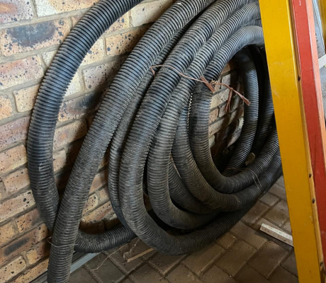 (162- S/OORD OB)- THICK BLACK CORRUGATED POLYTHELENE PIPE- R 250