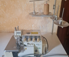 (116- S/OORD H)- INDUSTRIAL OVERLOCKER AND TABLE- R 8000